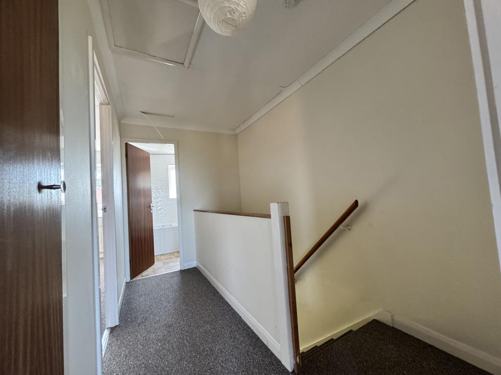 Lot: 76 - TWO-BEDROOM END-TERRACE HOUSE - Landing area with access to the loft space